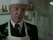 Von Berkow cooking while interrogating Renoudot.