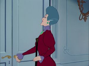 Lady Tremaine about to open the front door.