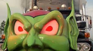 Green Goblin's glowing red eyes.
