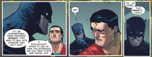 Batman laughing to a horrific act, a sign that he is beginning to lose his humanity.
