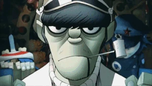 Murdoc in the On Melancholy Hill music video with Cyborg Noodle and 2-D.