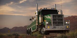 Onslaught's vehicle mode, a western 4900SF tow truck