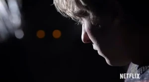 Ryuk watching Light after he first found the Death Note.