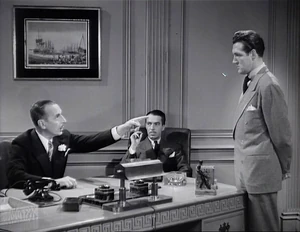 Mr. Grover ordering Fred Sutton to get started on some books