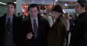 Earl reports his failure to find the lost missile chip in the men's toilet.