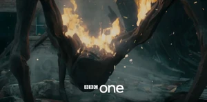 A burning Martian.