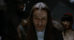 Top Dollar holding a private meeting with various criminals.