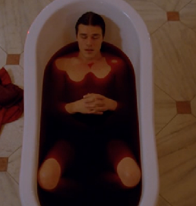 Dandy bathing in his mother's blood.