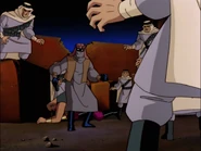 Ubu and his men surrounding Batman