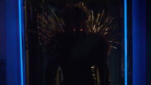 Ryuk watching Light and Mia.