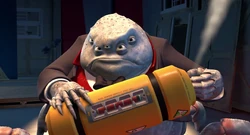 Waternoose uncorking a canister.