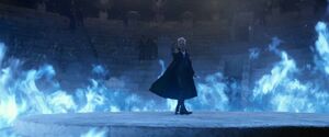 Grindelwald casting a circle of blue flame to divide followers from enemies.