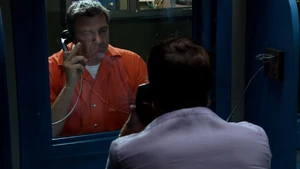 Isaak in prison while speaking to Dexter Morgan.