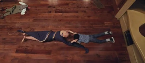 The Grand High Witch having pulled Charlie out of the vent.