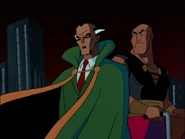 Ubu and his master receiving an expected visit from Batman and Robin