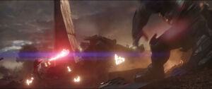 Scarlet Witch unleashes her psionic blasts on Thanos.