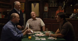Phil gets payback on Dan by conning him into losing his co-ownership of The Queen Vic in their poker game (2000).