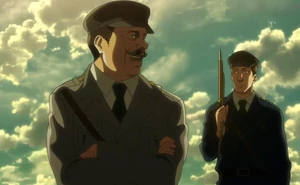 Gross with subordinate.png (601 KB) Gross as a Sergeant Major, "explaining" one of his own sadistic antics to a rookie subordinate.