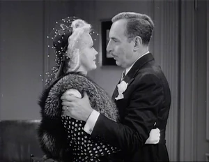 Grover romancing Peggy while revealing what he intends to do with Martha once they're married