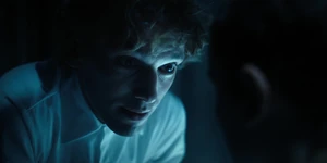 One's small sly grin after manipulating El.