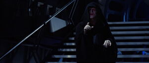 Palpatine lifting his hands up to use Force Lighting.