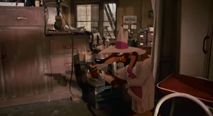 "Hold it right here!" - Smartass holding a gun, and his evil glare.