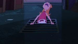 Beatrice crawling out of the storm drain.