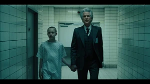Brenner escorting Ten through the lab.