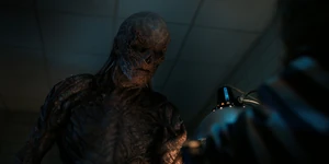 Vecna looming over Nancy.