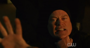 Darhk is almost killed by his younger self