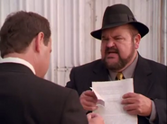 Lucre fighting with Mr. Toler over the check