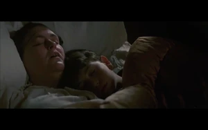 Pink sleeping with his mother.