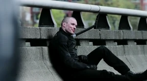 Ajax pinned to the railing, to no effect, while listening to Deadpool's and Colossus's argument.