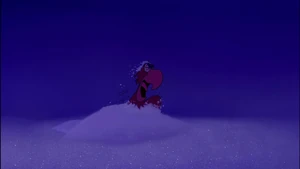 Iago coughing up sand.