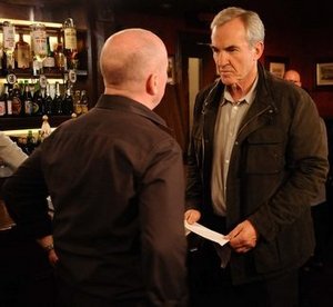 Phil Mitchell with his evil uncle Archie Mitchell.