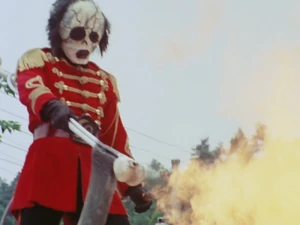 Major Skull shooting fire from his scythe.