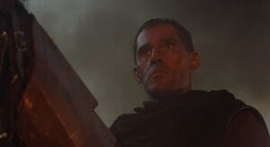 Malagant torching a village.