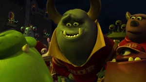 Randall at the left seeing Johnny telling Mike if Oozma Kappa lose, no one will remember them.