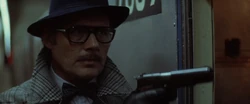 Mr. Blue seizing control of the Pelham 123 subway train
