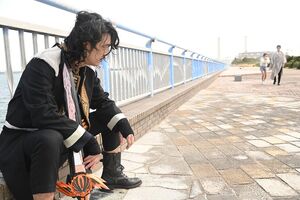 Bacht is approached by Mei and Yuri.