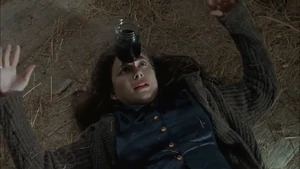 Gina removing a deadly bottle of acid from her forehead.