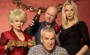 Phil in the "Who Killed Archie?" poster with Peggy and Ronnie for their Christmas in 2009.