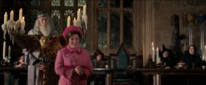Umbridge rudely interrupting Dumbledore's speech.