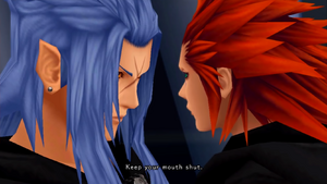 Axel angrily telling Saïx to keep his mouth shut.