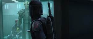 A Death Watch trooper silences the Sith brothers.