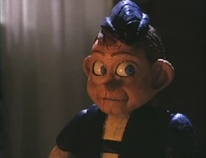 Pinocchio looking at Jennifer.