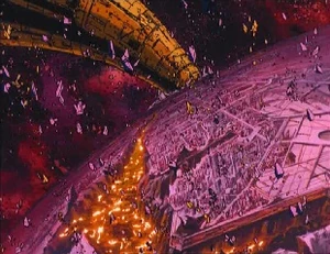 Unicron's pinchers stabs Planet Lithone.