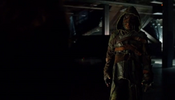 Ragman appears during the weapons deal