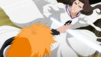 Ichigo blocks Aizen's attack