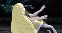 A defeated Lusamine collapsing to the ground.